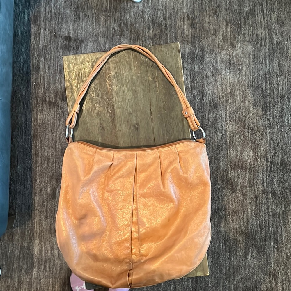 Hobo camel brown leather bag.